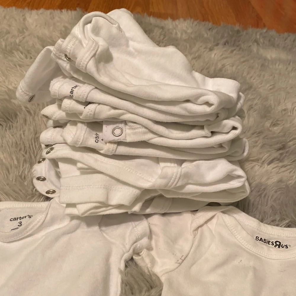Bundle of 11 white short sleeved onesies